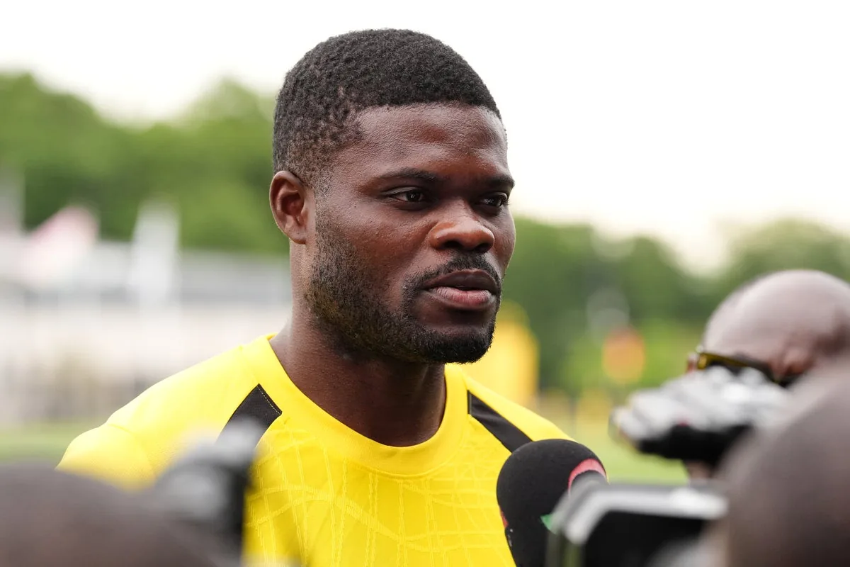 Partey Handshake Snub